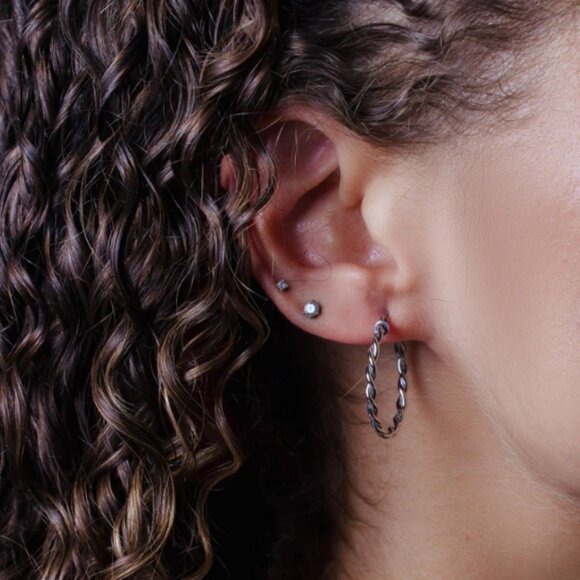 Amazon.com: MORGAN & PAIGE .925 Sterling Silver Rhodium, 14K  Sterling Silver 925 Rhodium Plated 20mm Twisted Hoop Earrings